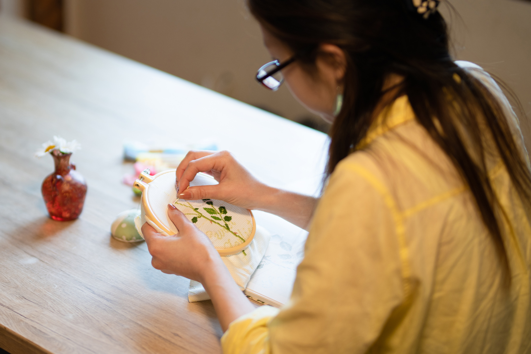 Woman embroidering